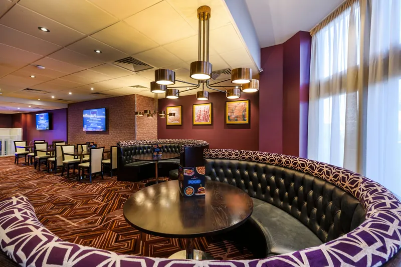 Lounge seating area inside Genting Casino Blackpool