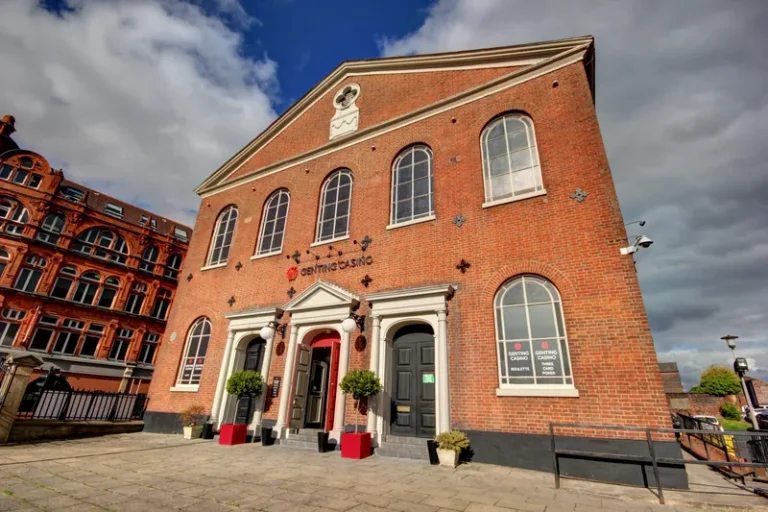 Exterior of Genting Casino Bolton in a red-brick building