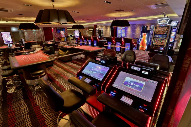 Gaming floor with roulette and slot machines at Genting Casino Bolton