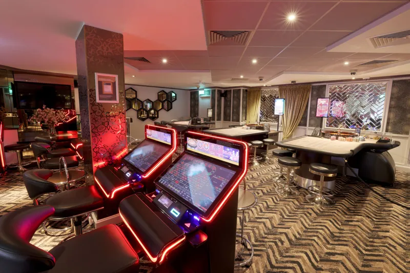 Gaming floor with electronic roulette terminals at Genting Casino Brighton