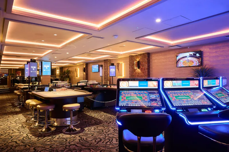 Gaming floor with electronic roulette at Genting Casino Cromwell Road