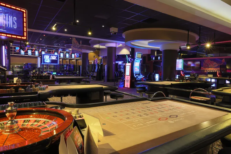 Genting Casino Manchester gaming floor with roulette and slot machines