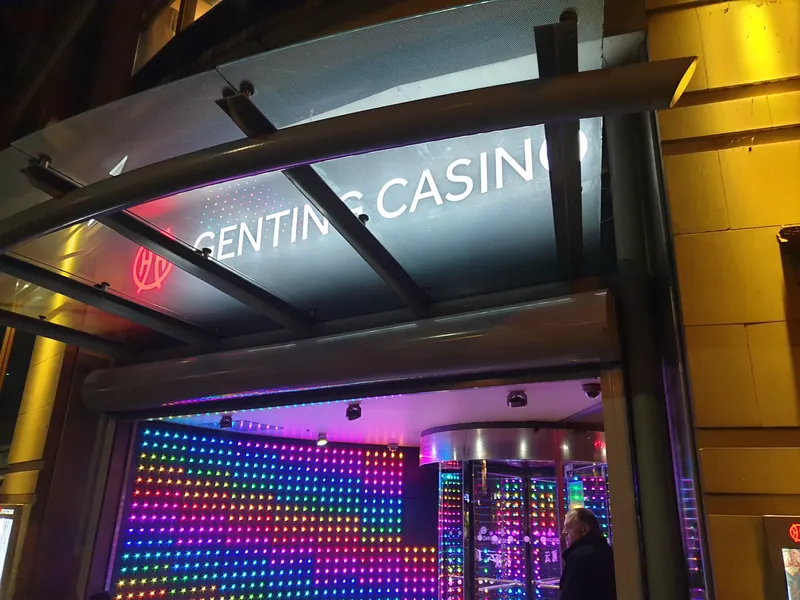 Genting Casino Manchester illuminated entrance at night