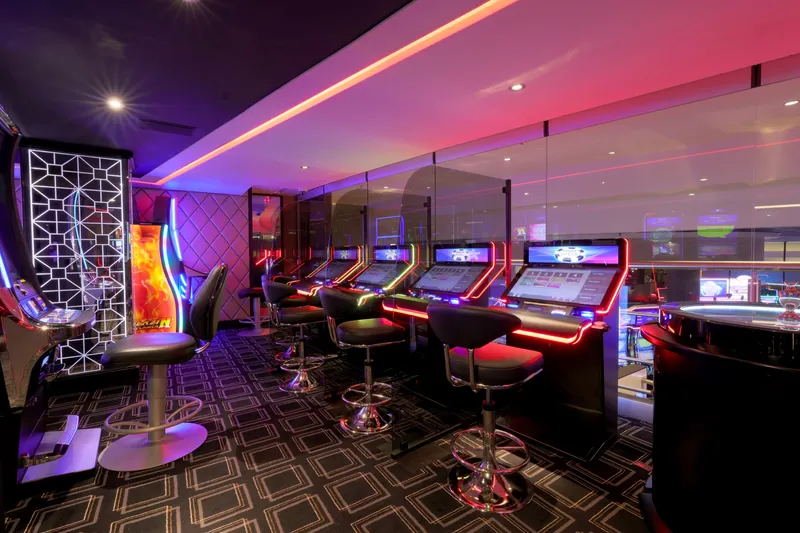 Genting Casino Manchester slot machines with neon lighting