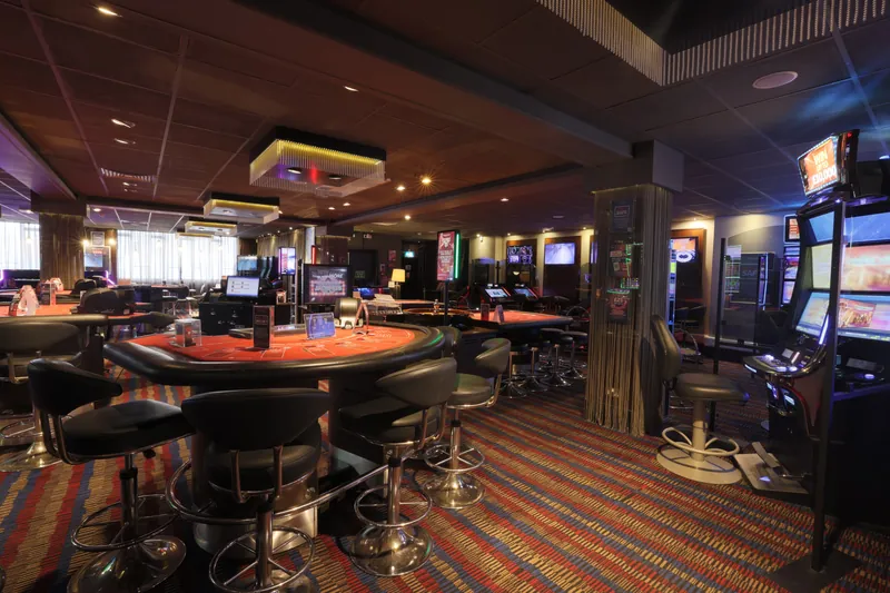 Gaming floor at Genting Casino Plymouth with roulette table and slots