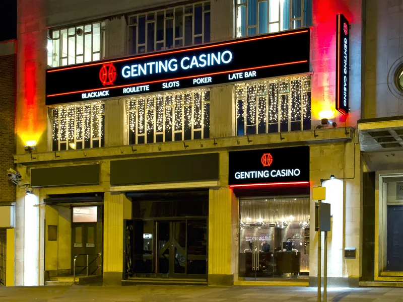 Exterior of Genting Casino Plymouth at night with illuminated signage