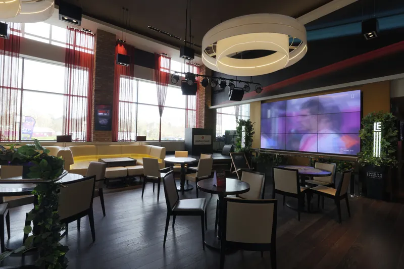 Lounge and restaurant seating inside Genting Casino Reading