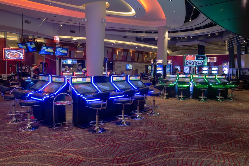 Gaming floor with electronic machines at Genting Casino Resorts World Birmingham