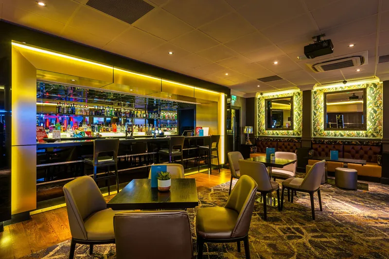 Gaming floor with slot machines at Genting Casino Salford