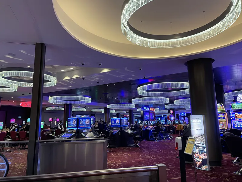 Gaming floor with slot machines at Genting Casino Stratford