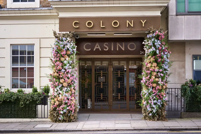 Entrance of The Colony Club with floral doorway