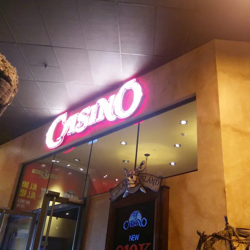Neon entrance to Coral Island Casino