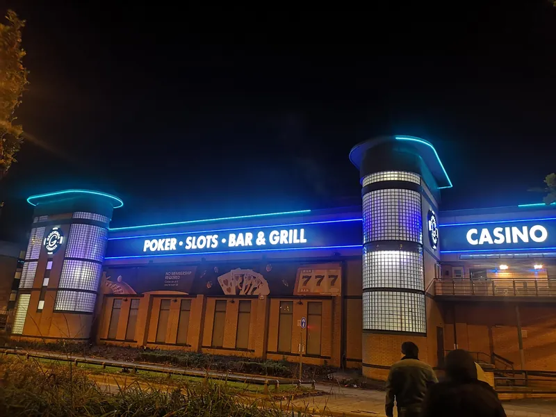 Side exterior of Grosvenor Casino Leeds Westgate at night