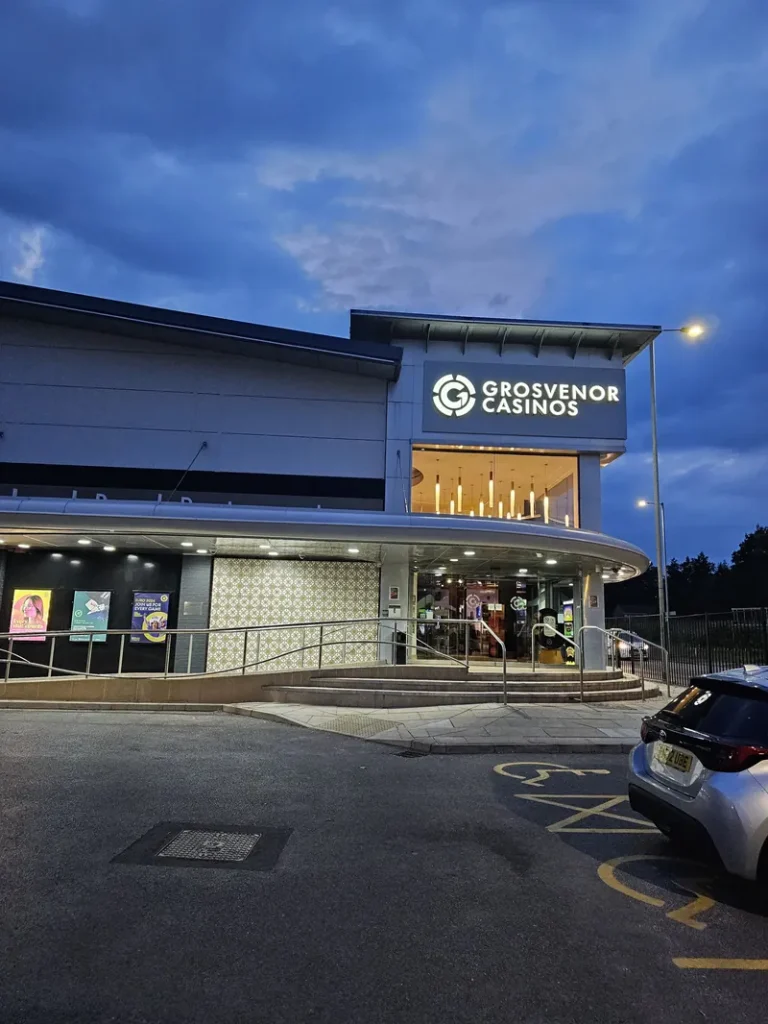 Evening entrance to Grosvenor Casino Manchester Bury New Road